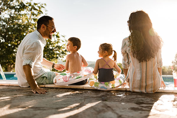 Family by the pool