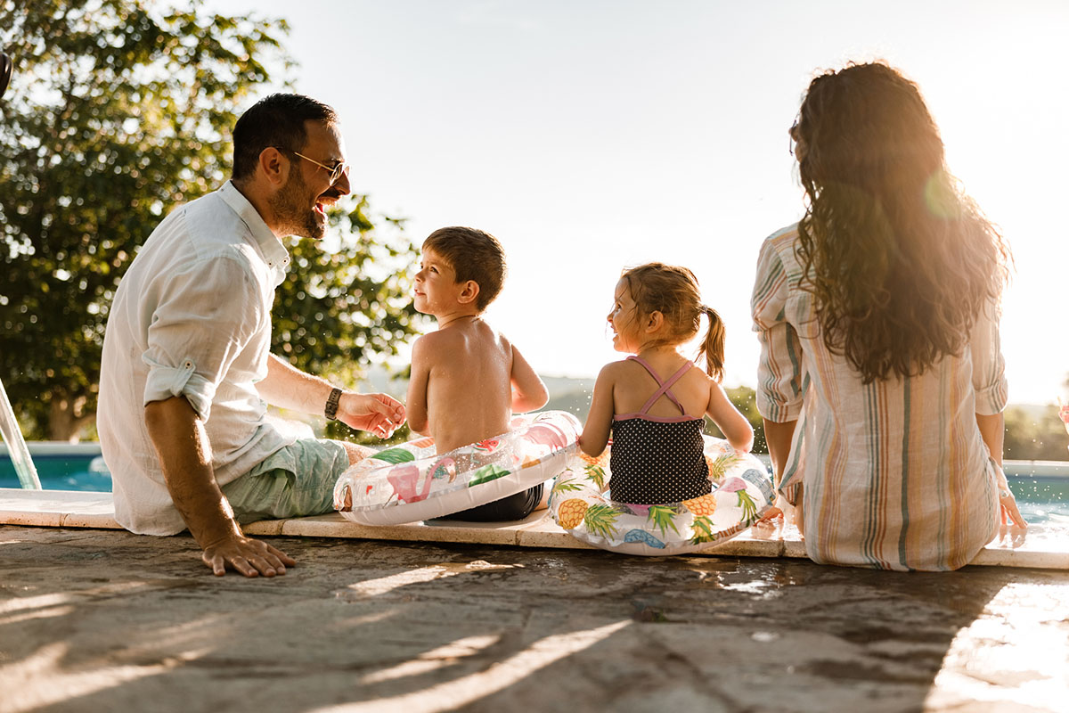 Family by the pool