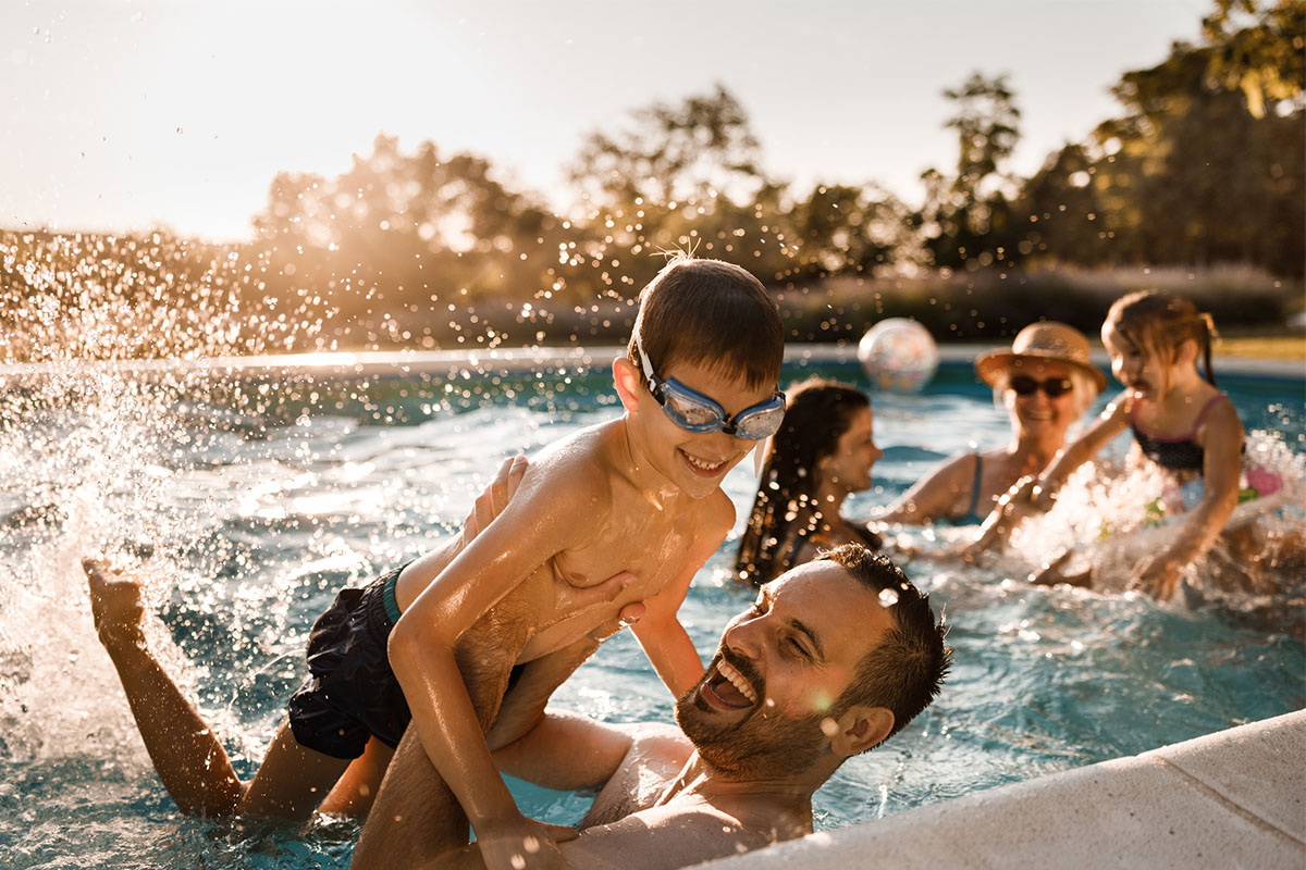 Family by the playing-in-pool